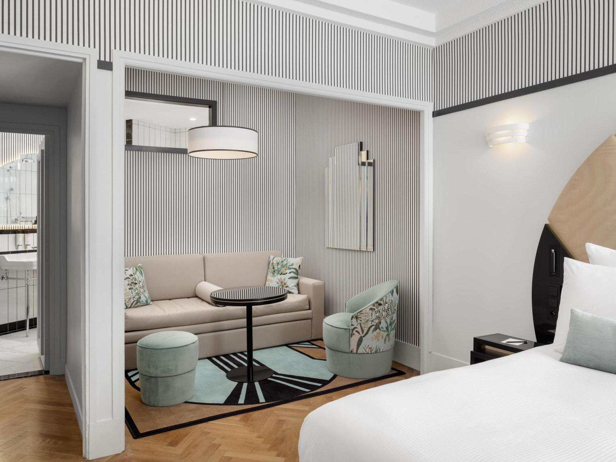 Deluxe Double Room with Sofa Bed and Balcony - Sea View/Upper Floor